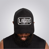 KOBO Metal Plate Trucker Hat: Lagos Midnight Black