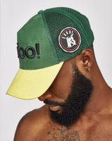 KOBO Suede Trucker Hat: Naija Forest & Palm Gold