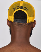 KOBO Suede Trucker Hat: Midnight Black & Palm Gold