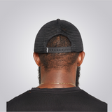 KOBO Metal Plate Trucker Hat: Lagos Midnight Black